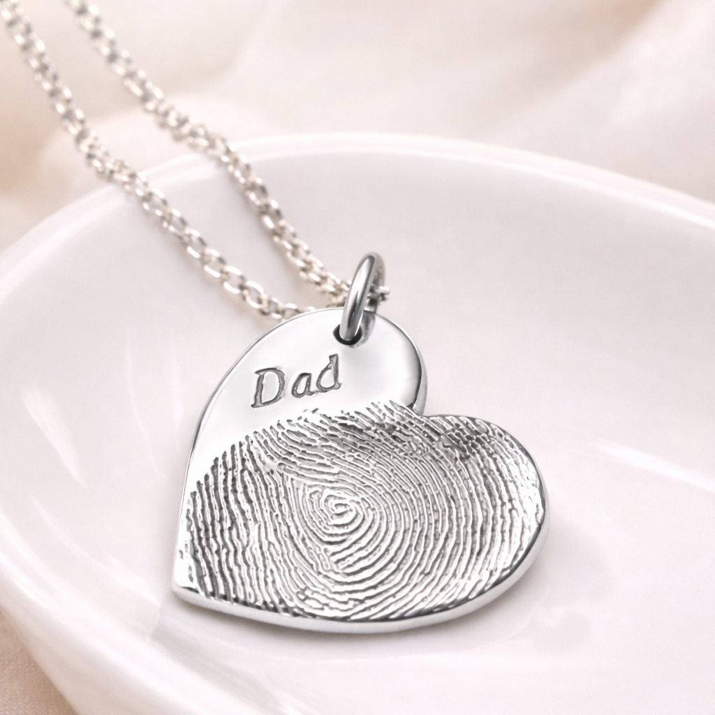 Heart necklace with a fingerprint on it
