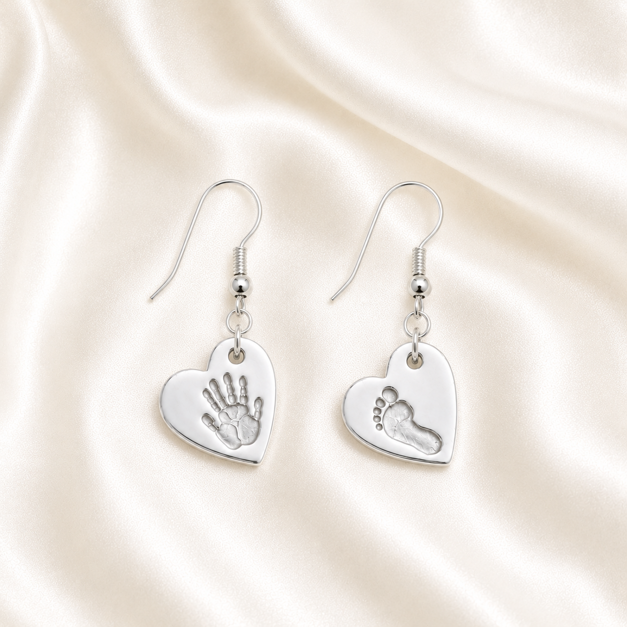 Handprint and footprint on silver heart earrings