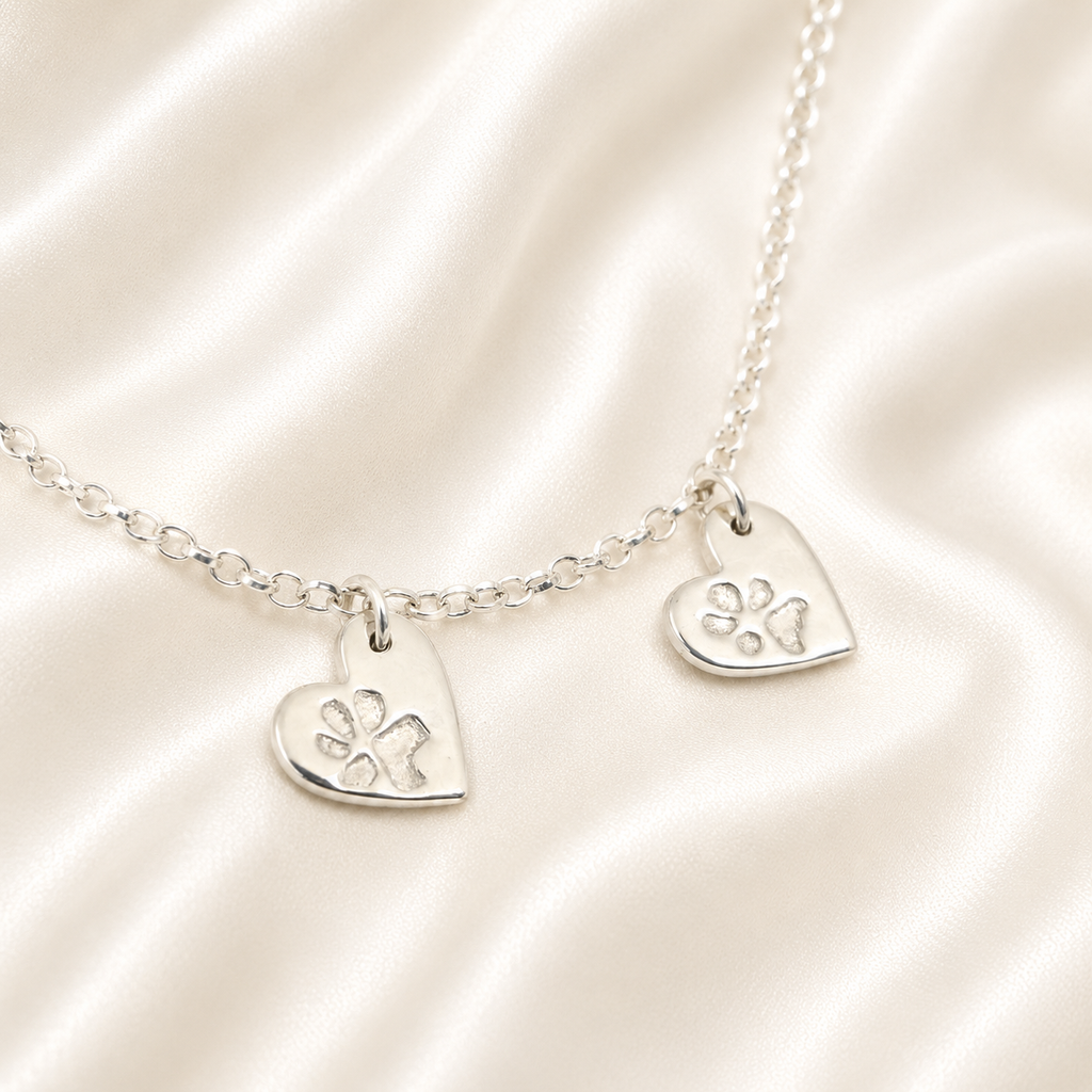 Pawprints on heart charms silver bracelet