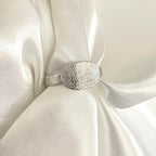 fingerprint on oval ring