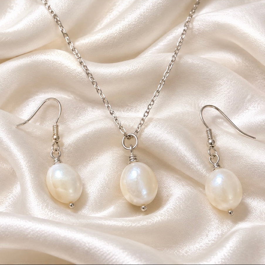 Pearl set of drop down earrings and necklace