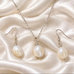Pearl set of drop down earrings and necklace