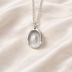 Fingerprint on a teardrop silver necklace