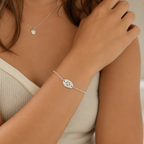 Personalised oval charm bracelet with pawprint on it
