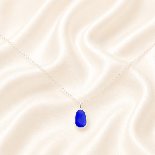 bright blue seaglass in silver with a necklace