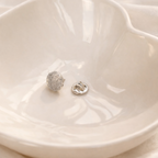 fingerprint pin in ceramic dish