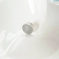 fingerprint on a sterling silver pin