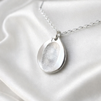 Fingerprint on a teardrop silver necklace