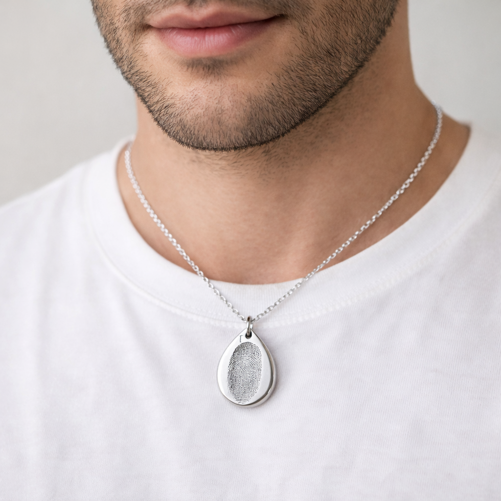 Man wearing teardrop fingerprint necklace