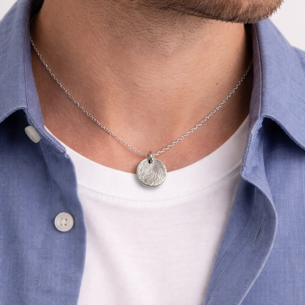 circle fingerprint necklace on a man
